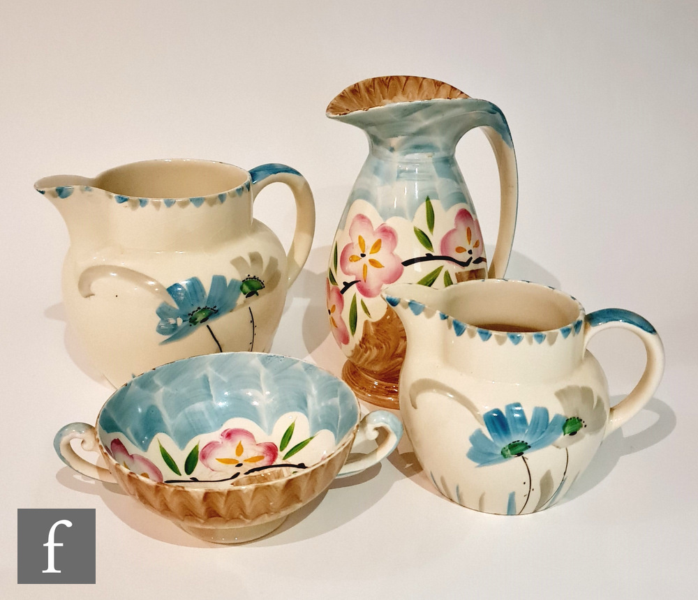 Four pieces of 1930s Art Deco Myott comprising a 'Chicken Neck' jug decorated in the hand painted