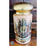 A large 19th century painted pharmaceutical apothecary glass drug jar and cover, the central