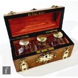 A late 19th century Victorian perfume casket in the Gothic taste, walnut case with brass inlay and