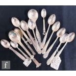 A collection of assorted 1930s and later Danish silver teaspoons of varying form, makers to