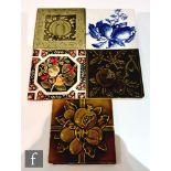 Five assorted early 20th Century 6in dust pressed tiles decorated with fruit and foliage to