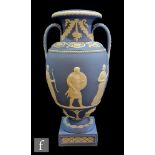 A later 20th Century Wedgwood blue Jasperware Procession of the Deities vase from the Genius
