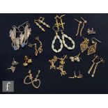 Fifteen pairs of assorted earrings to include gold and silver, stud and drop examples. (15)