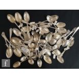 A parcel lot of assorted hallmarked silver teaspoons to include engraved, pierced and plain