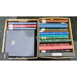 A collection of loose used world stamps and first day covers contained in twenty three albums. (23)