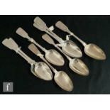 Seven Georgian and later hallmarked silver fiddle pattern table spoons, six with engraved initials