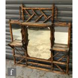 A late Victorian bamboo framed overmantel mirror in the Aesthetic taste, with triple mirror