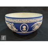 A later 20th Century Wedgwood dark blue Jasperware bowl commemorating the 40th Anniversary of the