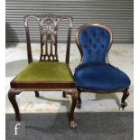 A 19th Century mahogany standard chair in the Chippendale style, with a foliate carved frame and