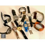 Thirteen assorted quartz fashion watches to include Pulsar and Swatch examples. (13)