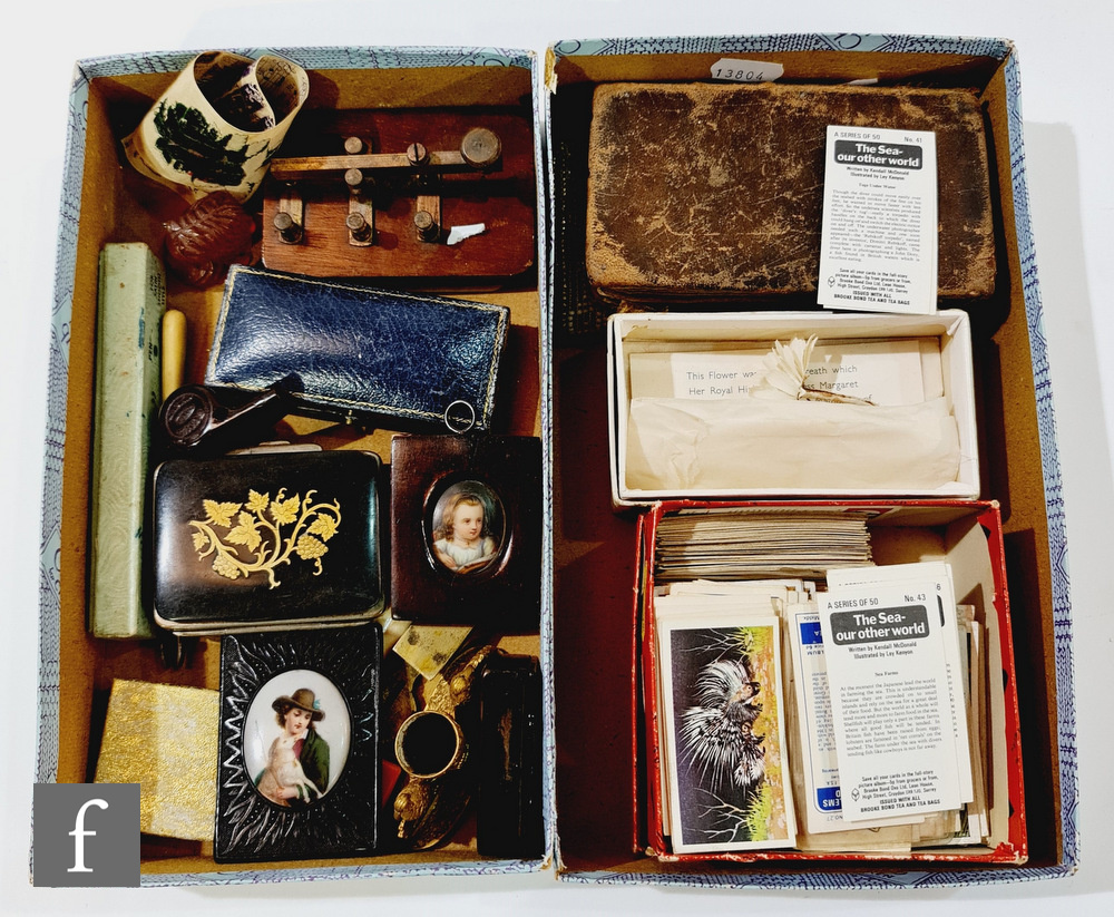 Two 19th century miniature painted porcelain panels, a snuff box, a morse code key, a leaf decorated