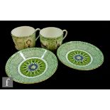A boxed set of two Wedgwood Millennium Collection cups and saucers decorated with historical