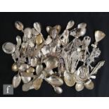 A parcel lot of continental silver and white metal tea and other spoons to include figural,