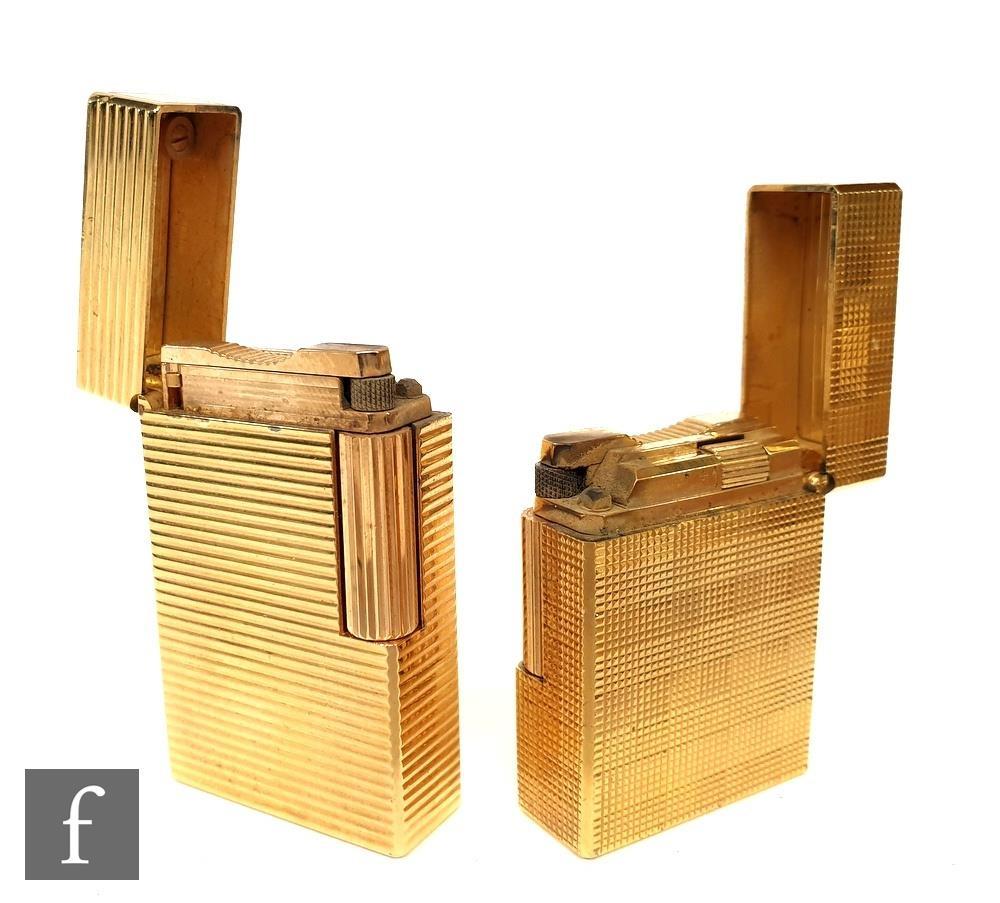 Two Dupont gold plated lighters of rectangular form, numbered 13 HAU 82 and 13 HFS 50, largest 5.