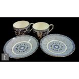 A boxed set of two Wedgwood Millennium Collection cups and saucers decorated with historical