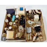 An extensive collection of post 1970s perfume and glass cologne bottles and stoppers, some in