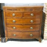 A George III chequer strung mahogany bow front chest of two short and three long drawers below a