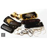 Two similar pairs of gilt lorgnettes with floral and scroll mounts, three cased pairs of spectacles,