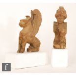 A 19th Century carved wooden figure of a griffin later mounted to a white painted base, together