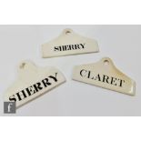 A collection of three 19th Century creamware bin labels, to include two sherry and one claret, one