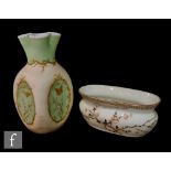 A late 19th Century Harrach opal glass vase of ovoid form with four dimple knocked sides and