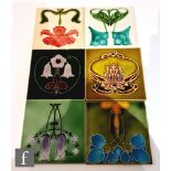 Six assorted early 20th Century 6in Art Nouveau tiles each with a stylised floral motif, to