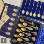 A composed cased set of nine hallmarked silver gilt tea spoons commemorating London buildings etc,