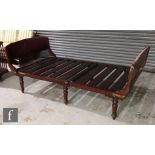 A Victorian mahogany folding campaign day bed frame, with removable turned and tapered legs,