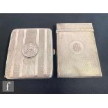 A Victorian hallmarked silver card case with engine turned decoration and central engraved initials,