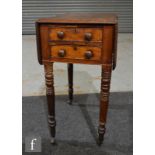 A 19th Century mahogany Pembroke work table, the drop flap sides above two frieze drawers and raised