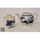 A small late 18th Century Worcester teapot of footed ovoid form decorated in the blue and white