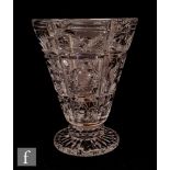 A 20th Century Stuart and Sons clear crystal vase of footed conical form, cut with panels of