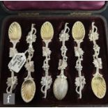 A cased set of six hallmarked teaspoons with shell bowls and leaf decoration to handle, length 12cm,