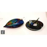 Two later 20th Century Lazlo glass paperweights, the first formed as a dragonfly seated on a lily