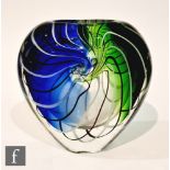 A contemporary glass vase of compressed tear form, internally decorated with a black and white