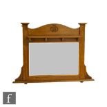 An Arts and Crafts inlaid oak overmantel mirror attributed to Shapland & Petter, with square