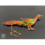 A modern 9ct hallmarked brooch modelled as a standing pheasant decorated in green and brown