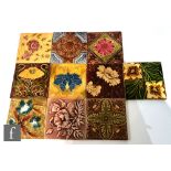 Ten assorted early 20th Century 6in Art Nouveau dust pressed tiles, to include a J.H Barratt & Co