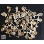 A collection of early to mid 20th Century Dutch silver spoons, mostly souvenir spoons with chased