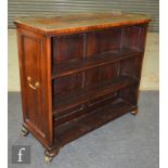 A 19th Century rosewood veneered twin sided open bookcase, with applied ormolu gallery and with