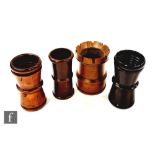 A 19th century castellated boxwood dice shaker, a plain lignum vitae shaker, a figured walnut