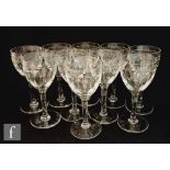 A set of ten later 20th Century crystal wine glasses, each with an ovoid bowl cut and polished