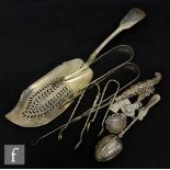 A collection of various Georgian and Victorian silver items to include a silver tea infuser,