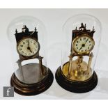 An Edwardian 365 day mantle clock, circular white enamelled dial in glass dome and a similar