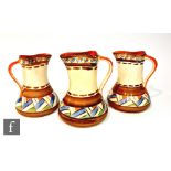 A pair of 1930s Myott Art Deco pinch jugs decorated in pattern H8301 with hand painted brown banding
