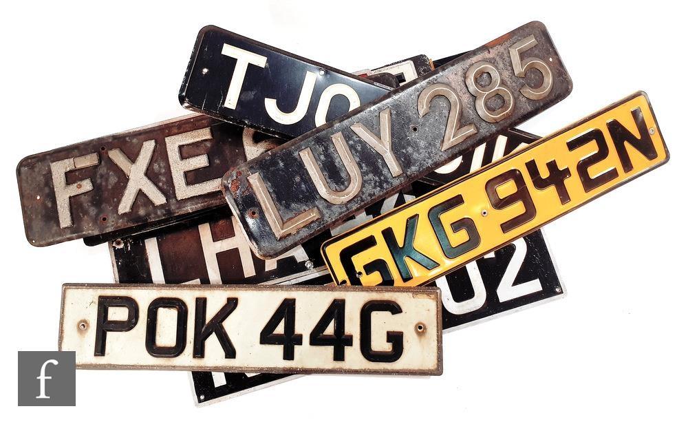 A collection of early and later vehicle license plates to include LUY285, FXE 671, FON181 and