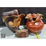 Two contemporary turned wooden vessels or vases of flared naturalistic form, heights 37cm and