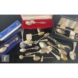 A collection of assorted silver commemorative and souvenir spoons to include examples for the