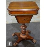 An early Victorian rosewood work table, the hinged square lid with canted corners enclosing a fitted