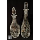 Two Webb Corbett clear crystal decanters, the first of tapering form cut with a diamond pattern,